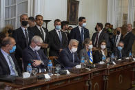 Israeli Foreign Minister Yair Lapid, third left, meets with Egyptian Foreign Minister Sameh Shoukry at Tahrir Palace in Cairo, Egypt, Thursday, Dec. 9, 2021. (AP Photo/Nariman El-Mofty)