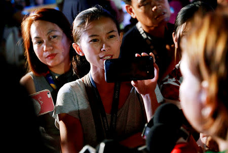 Rappler reporter Pia Ranada interviews Davao City Mayor Sara Duterte, the eldest daughter of President Rodrigo Duterte, after a campaign sortie in Calamba City, Laguna, Philippines, March 9, 2019. REUTERS/Eloisa Lopez