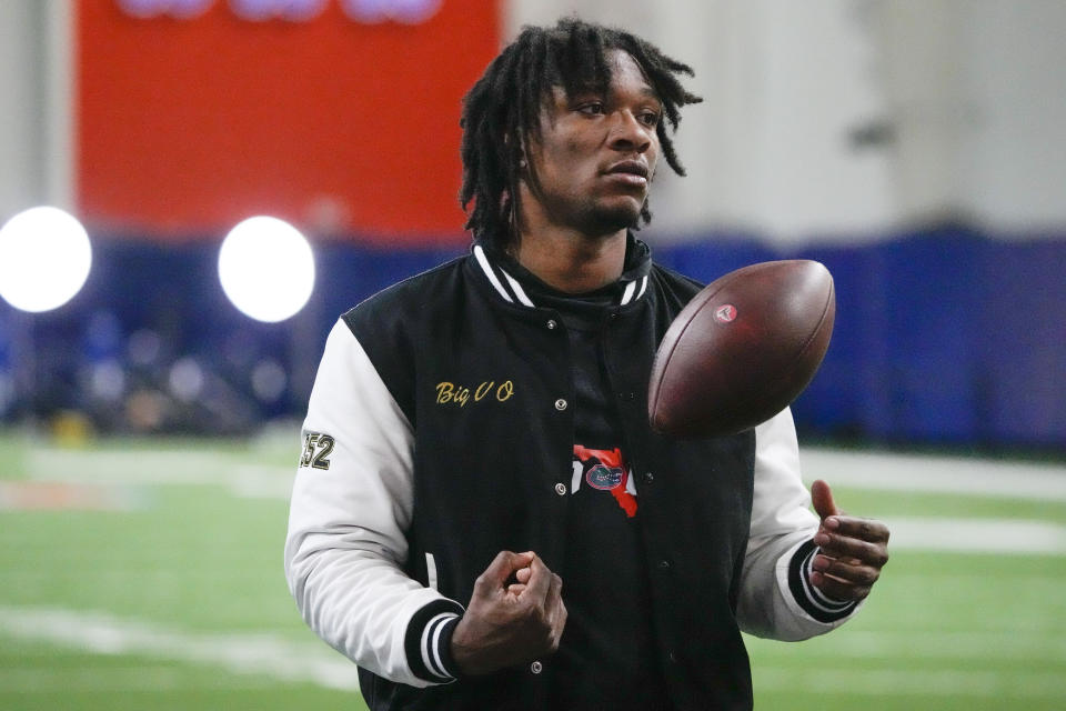 Florida quarterback Anthony Richardson tosses a ball around during an NFL football Pro Day, Thursday, March 30, 2023, in Gainesville, Fla. (AP Photo/John Raoux)