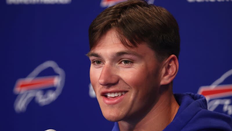 Buffalo Bills second-round draft pick Cole Bishop addresses the media during an NFL football news conference in Orchard Park, N.Y., Saturday, April 27, 2024.