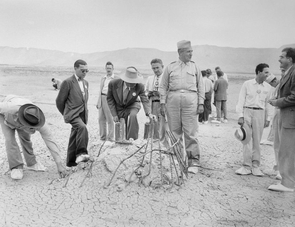 Scientists and military working at Los Alamos