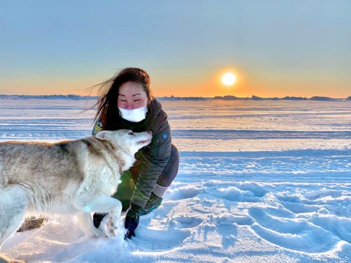 Carol with her dog, Solar, in Nome, Alaska. (Photo: Courtesy Carol Seppilu)