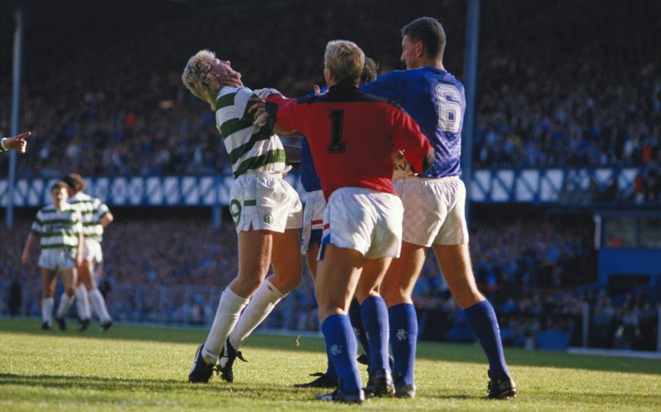 The Celtic striker Frank McAvennie is grabbed by the Rangers defender Terry Butcher, with his teammate Chris Woods, during a fracas in the Old Firm derby in 1987: Murray represented all three in court, as well as Rangers' Graham Roberts