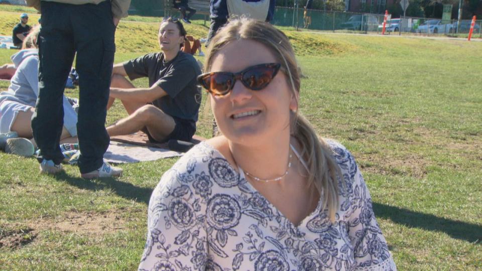 Emily Poncini enjoys warm weather and sunshine at Kitsilano Beach in Vancouver on Saturday, March 16, 2023.