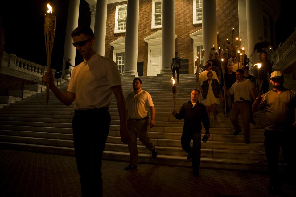 <p>Neo-Nazis, Alt-Right, and White Supremacists march through the University of Virginia Campus with torches in Charlottesville, Va., on Aug. 11, 2017. (Photo: Samuel Corum/Anadolu Agency/Getty Images) </p>