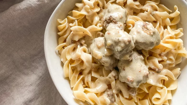 Meatballs and cream sauce with pasta twirls