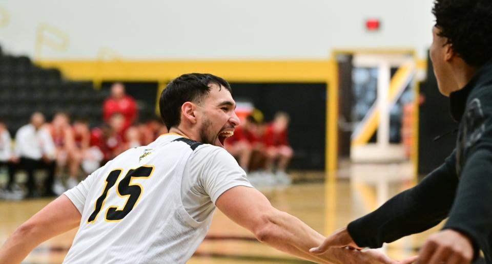 The College of Wooster's Vinni Veikalas celebrates during the Scots' win over Wittenberg.