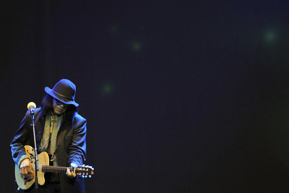 FILE - Sixto Rodriguez performs on stage at Carnival City, near Johannesburg, on Feb. 12, 2013. Singer and songwriter Rodriguez, who became the subject of the Oscar-winning documentary “Searching for Sugarman” has died, according to the Sugarman.org website on Tuesday, Aug. 8, 2023, and confirmed Wednesday by his granddaughter. He was 81. (AP Photo, File)