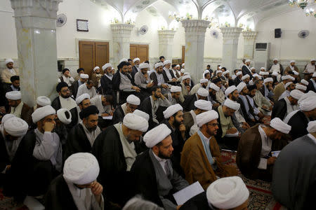 Shi'ite clerics study at al-Gharawiya school run by al-Hawza al-Ilmiyya in Najaf, Iraq, August 13, 2017. REUTERS/Abdullah Dhiaa Al-deen