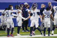 Tennessee Titans quarterback Ryan Tannehill (17) comes to the sideline after scoring a touchdown against the Indianapolis Colts in the first half of an NFL football game in Indianapolis, Sunday, Nov. 29, 2020. (AP Photo/Darron Cummings)