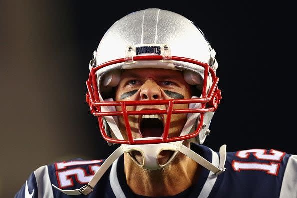 2017:  Tom Brady #12 of the New England Patriots yells as he runs onto the field before the game against the Kansas City Chiefs at Gillette Stadium on September 7, 2017 in Foxboro, Massachusetts.  (Photo by Maddie Meyer/Getty Images)