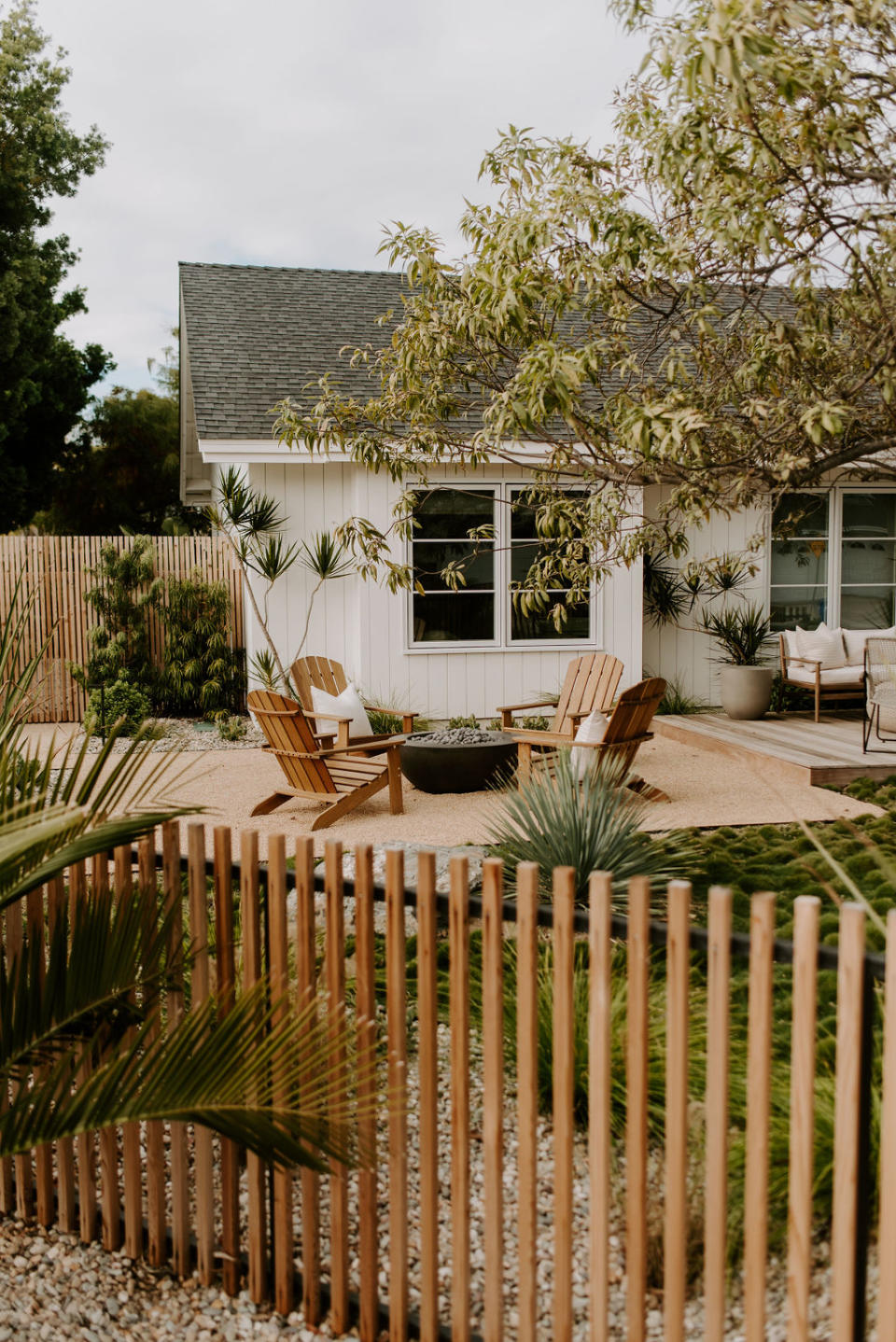 a seating area in a front yard