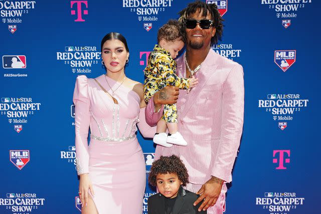 <p>Daniel Shirey/MLB Photos via Getty</p> Ronald Acuña Jr., Maria Laborde, and their two sons