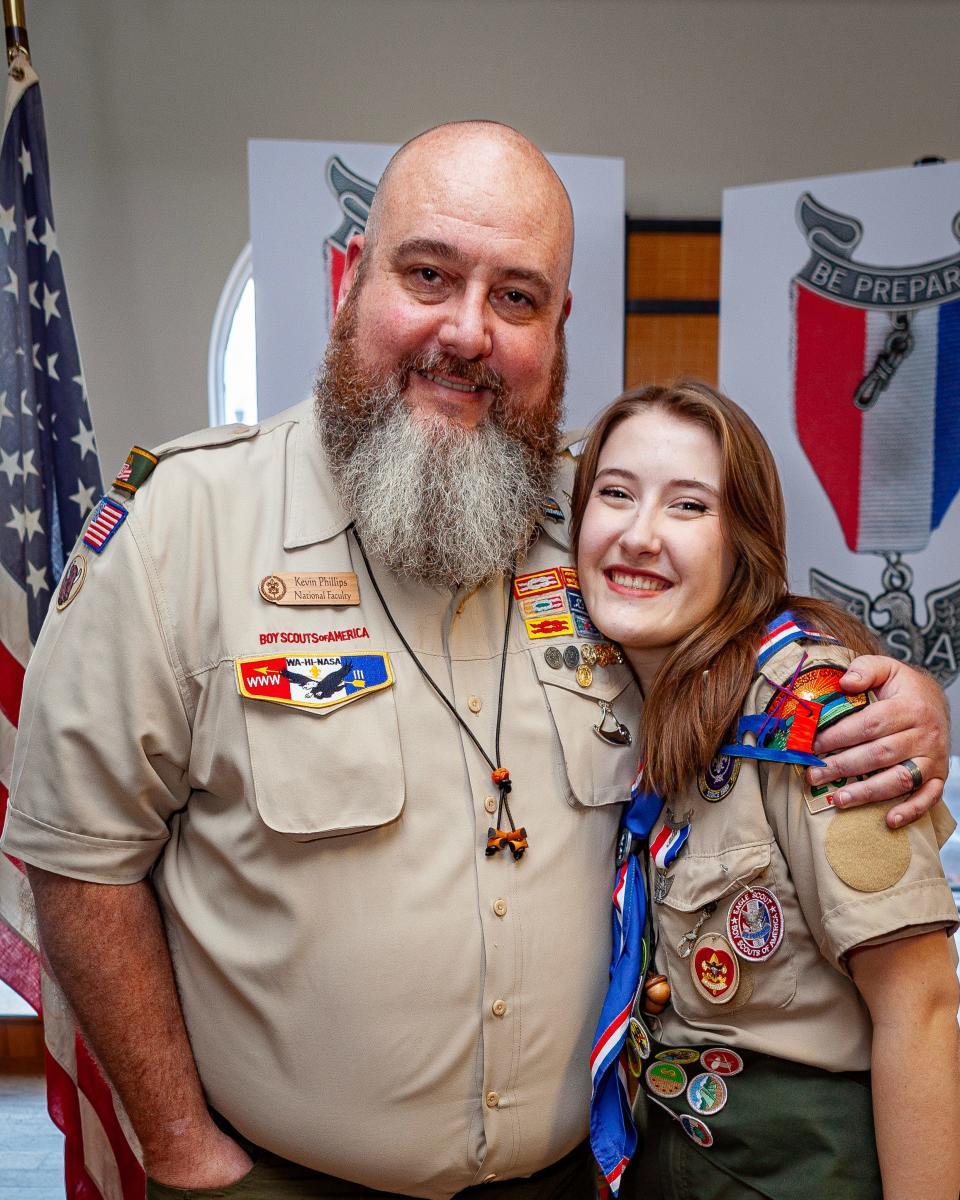 Eagle Scout Rachel Oppmann with Kevin Phillips, leader of Tennessee's first all-girl troop in Scouts BSA, formerly Boy Scouts of America, in Murfreesboro, Tenn., in 2023