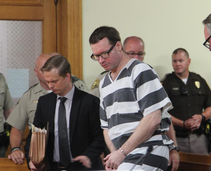 Michael Thomas Lang appears in court in Grundy Center, Iowa, Monday, June 27, 2022. Lang was sentenced to life in prison without the possibility of parole for fatally shooting an Iowa State Patrol trooper last year during a standoff and shootout with police. ( Jeff Reinitz/The Courier via AP)