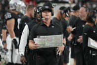 Las Vegas Raiders head coach Jon Gruden stands on the sidelines during the first half of an NFL football game against the Baltimore Ravens, Monday, Sept. 13, 2021, in Las Vegas. (AP Photo/Rick Scuteri)