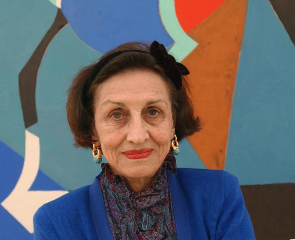 Françoise Gilot in 2003, in front of her painting Night Sky.