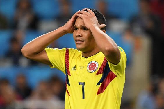 Colombia crash out early (AFP via Getty Images)