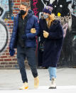 <p>Ryan Reynolds and Blake Lively bundle up for a walk around New York City on Jan. 24.</p>