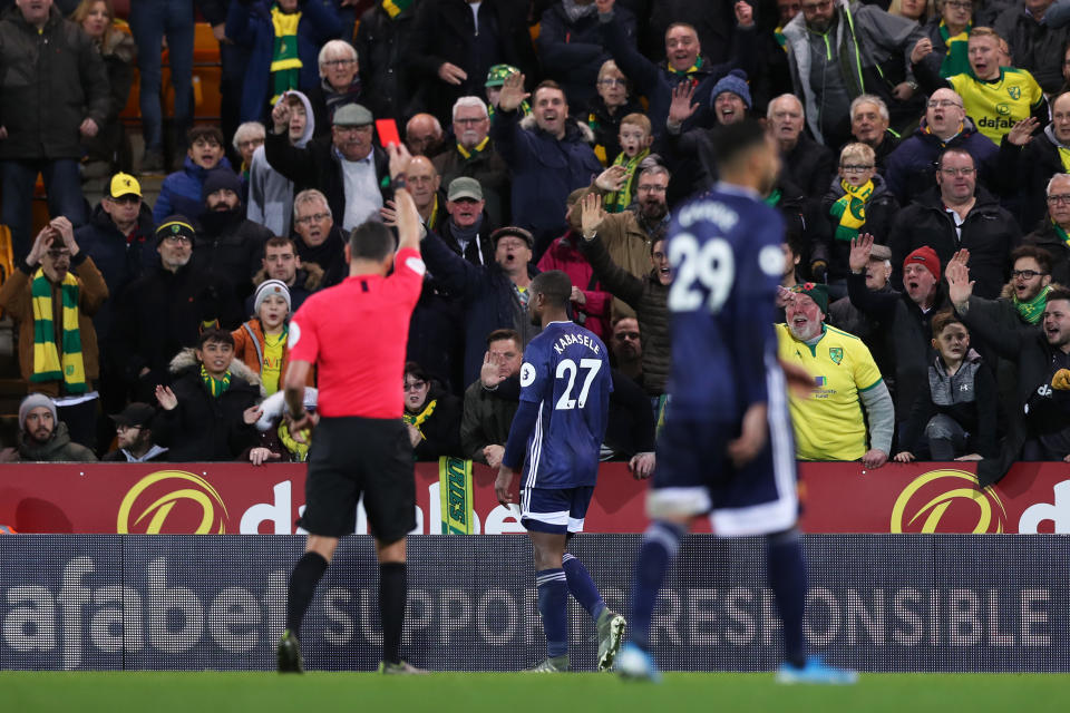 Kabasele is shown a red card. (Photo by Naomi Baker/Getty Images)