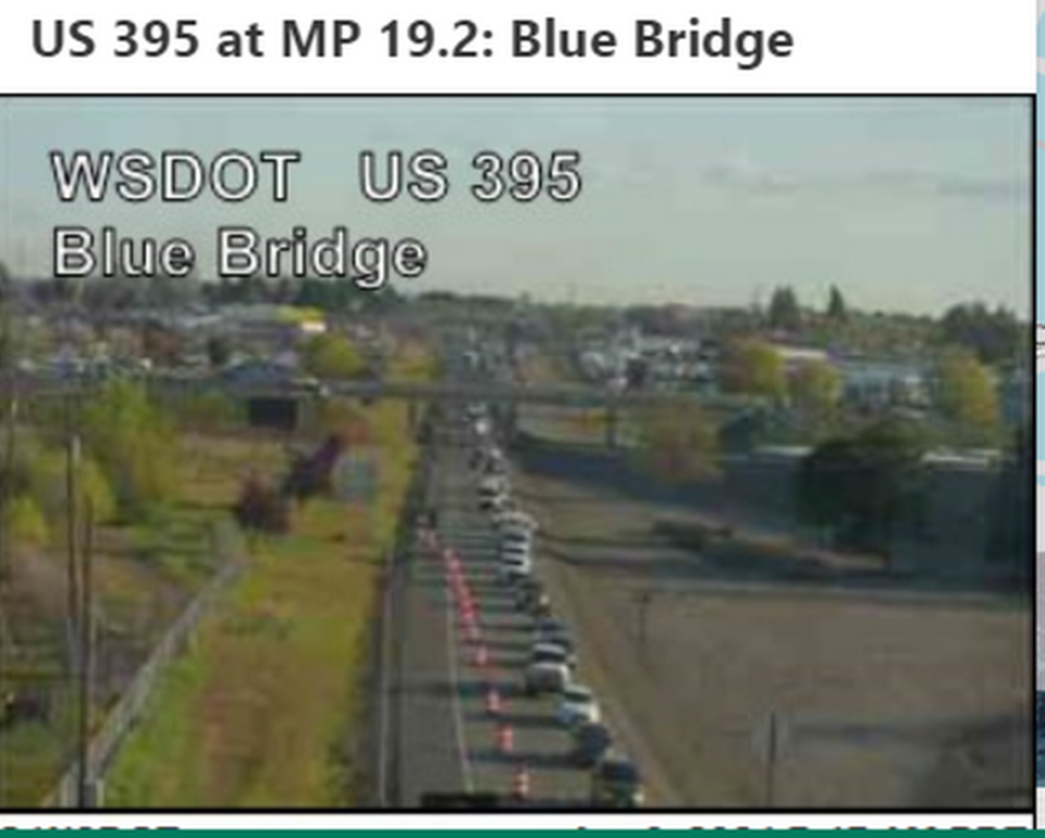 An early morning semi rollover accident just south of the blue bridge in Kennewick is snarling traffic on Highway 395 through Kennewick Tuesday morning. Image courtesy Washington State Department of Transportation