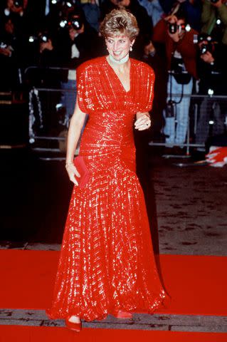 <p>Tim Graham Photo Library via Getty Images</p> Princess Diana's 1991 Hot Shots! premiere dress going up for auction