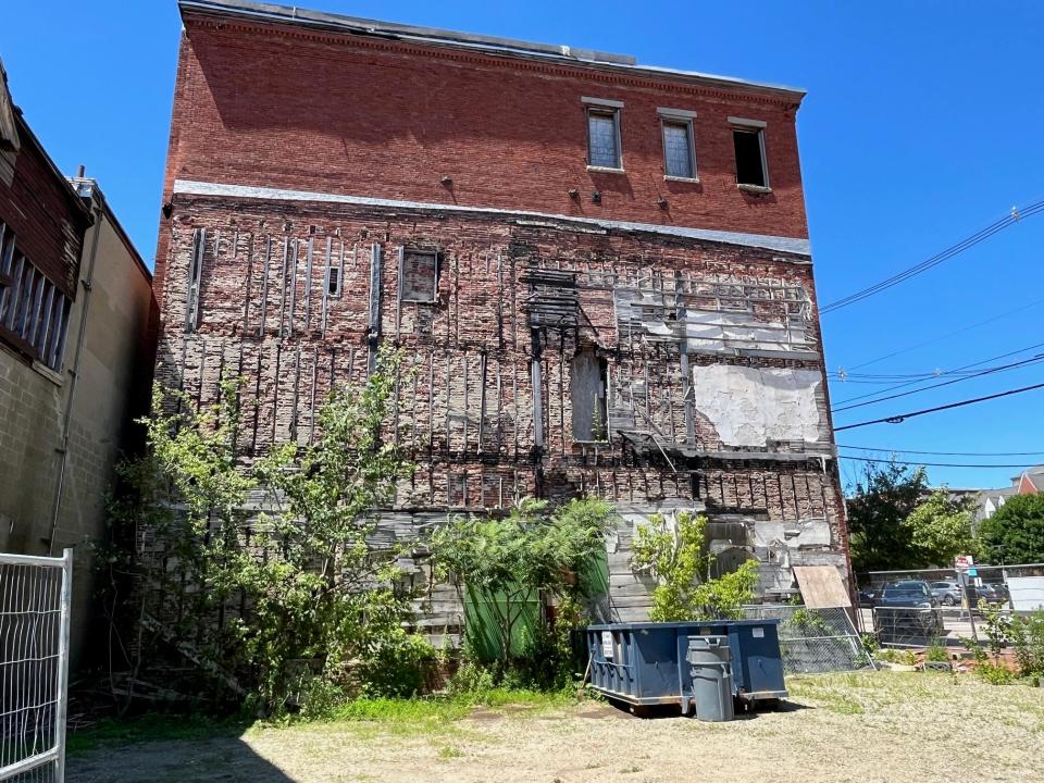 A fire in 2017 severly damaged the former Daily Times building in downtown Portsmouth, shown here Friday morning