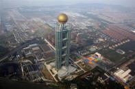 The newly inaugurated skyscraper tower of Huaxi village is seen in Huaxi village, Jiangsu province, October 7, 2011.