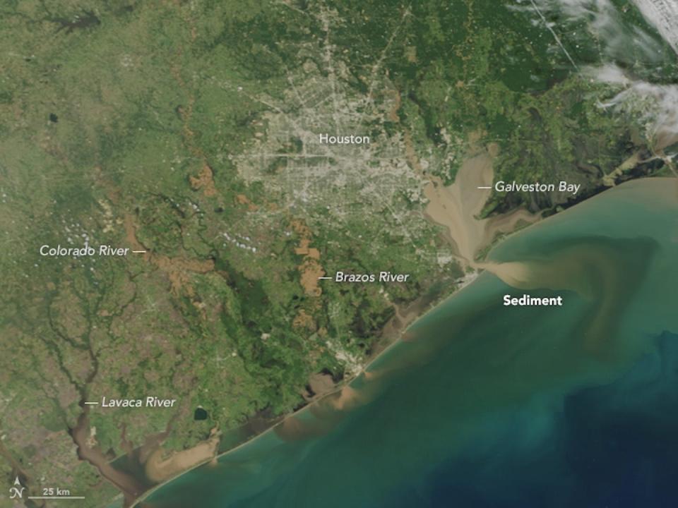 This satellite image, taken six days after Harvey made landfall, shows Galveston Bay and other rivers and bays around Houston filled with brown sediment-laden floodwaters. <a href="https://earthobservatory.nasa.gov/images/90866/texas-waters-run-brown-after-harvey" rel="nofollow noopener" target="_blank" data-ylk="slk:NASA Earth Observatory;elm:context_link;itc:0;sec:content-canvas" class="link ">NASA Earth Observatory</a>
