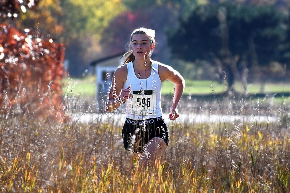 Howell's Mackenzie Wright won the KLAA cross country meet with a time of 19:02.1 Saturday, Oct. 22, 2022 at Huron Meadows Metropark.