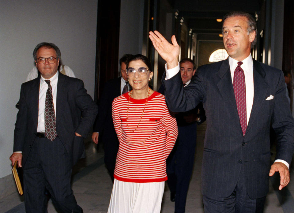 Biden, then chariman of the Senate Judiciary Committee, escorted Ginsburg, on Capitol Hill on June 15, 1993. (Marcy Nighswander / AP)