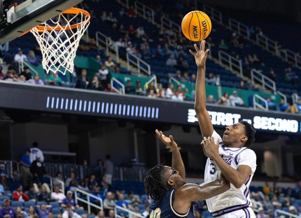 Kansas State’s Nae’Qwan Tomlin gets a shot off against Montana State’s Jubrile Belo during the second half of their first round NCAA Tournament game in Greensboro, NC on Friday night.