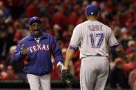 ST LOUIS, MO - OCTOBER 20: Manager Ron Washington and Nelson Cruz #17 of the Texas Rangers celebrate after defeating the St. Louis Cardinals 2-1 during Game Two of the MLB World Series at Busch Stadium on October 20, 2011 in St Louis, Missouri. (Photo by Ezra Shaw/Getty Images)