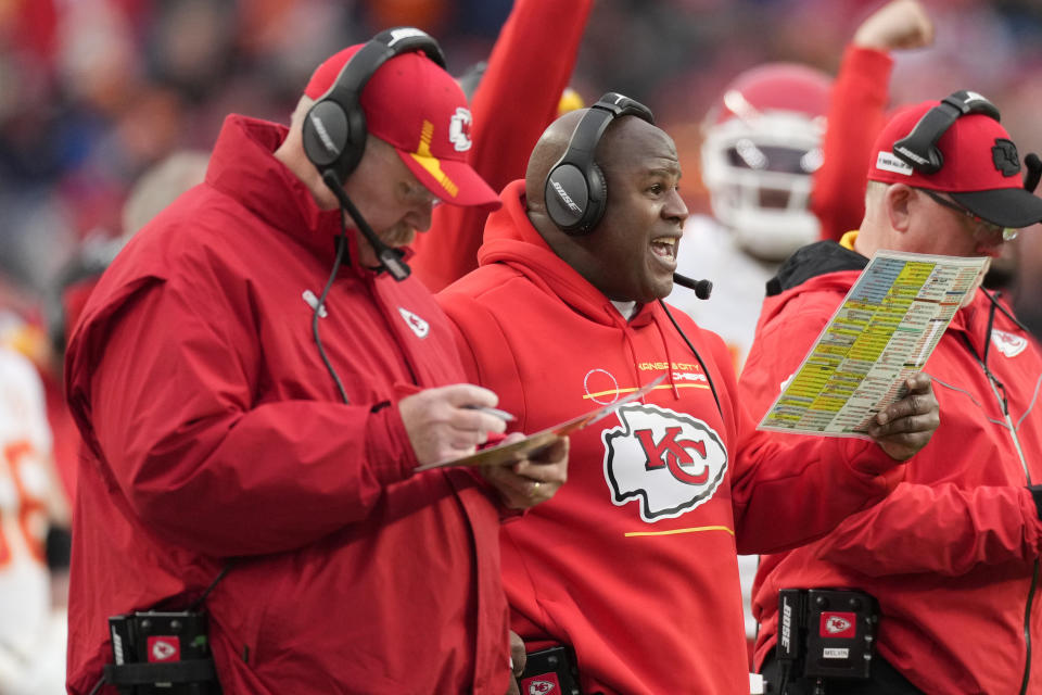 Kansas City Chiefs head coach Andy Reid, left, and offensive coordinator Eric Bieniemy are shown during the first half of an NFL football game against the Denver Broncos, Saturday, Jan. 8, 2022, in Denver. Passed over innumerable times for head jobs over the past few seasons, Eric Bieniemy is again a hot commodity as the Chiefs prepare for a divisional-round matchup with the Bills on Sunday night. (AP Photo/David Zalubowski)