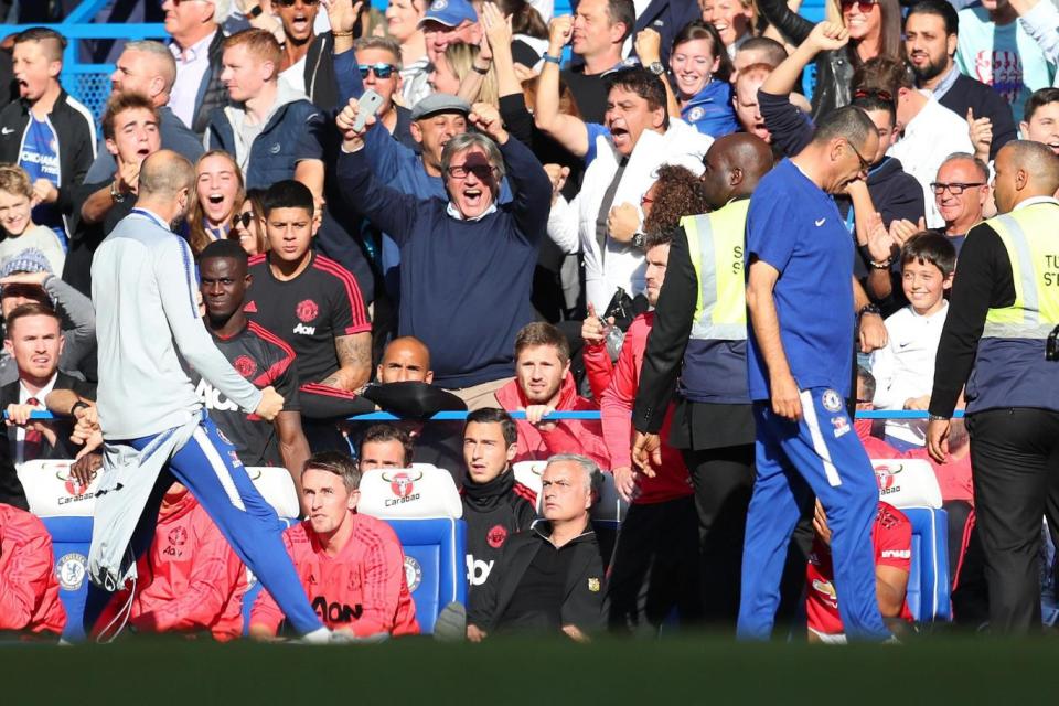 Ianni celebrated in front of the United bench. (Getty Images)