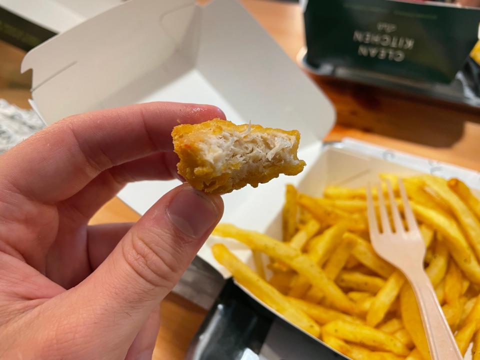 Picture of a part-eaten plant-based chicken nugget.
