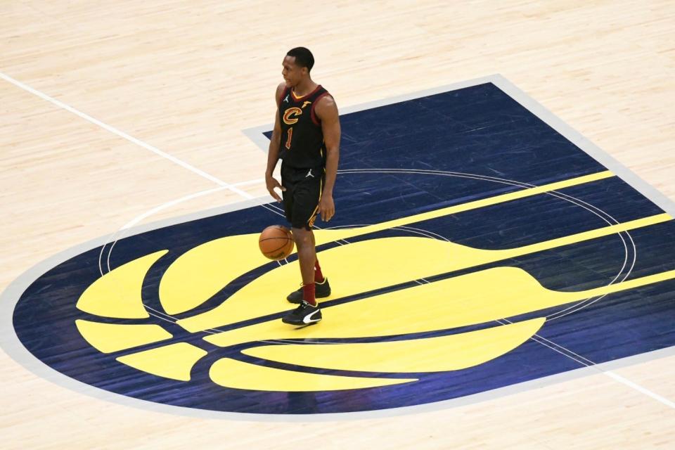 Cleveland's Rajon Rondo dribbles up the court as the Pacers host the Cavaliers at Gainbridge Fieldhouse in Indianapolis on Feb. 11, 2022.