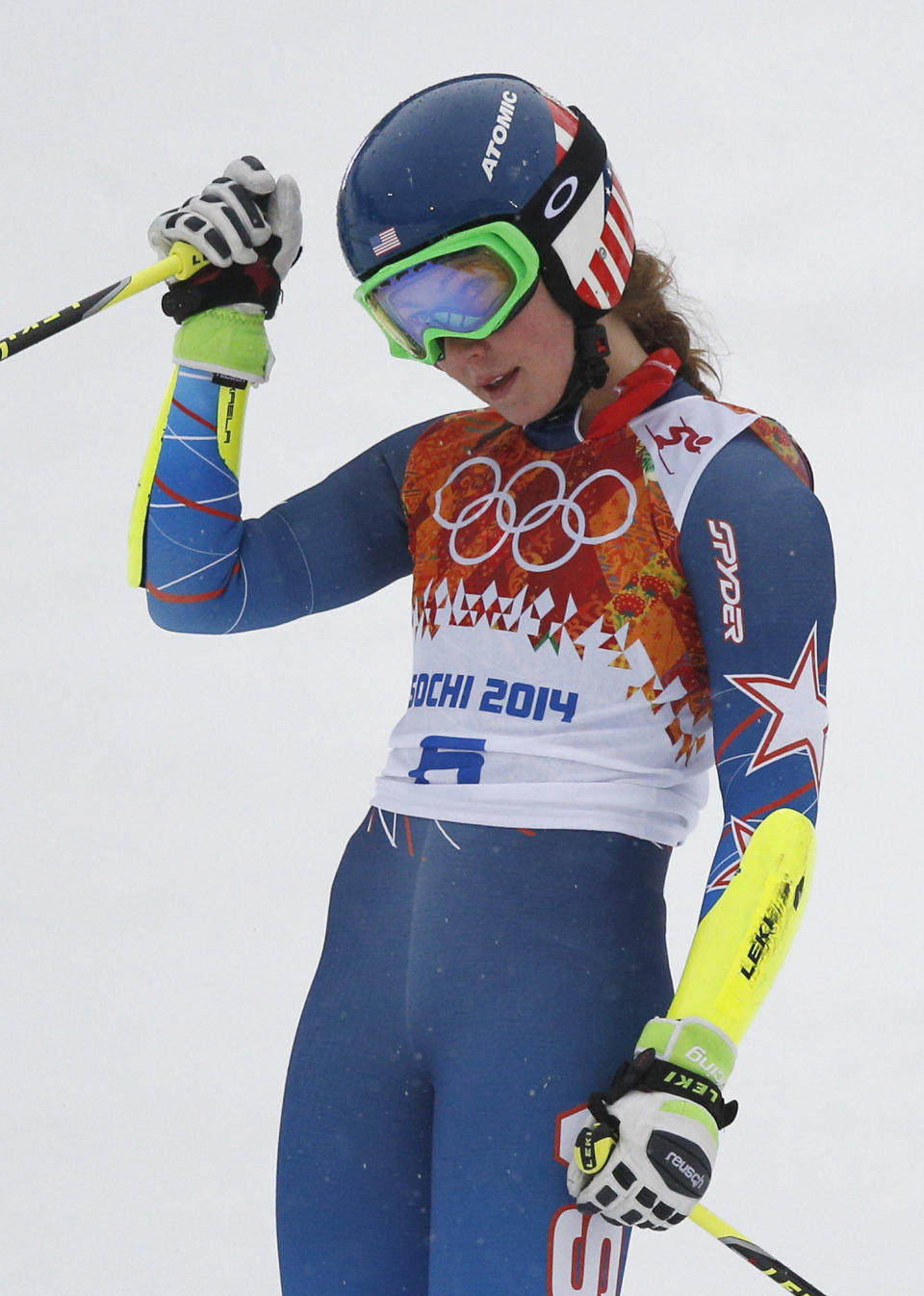 United States' Mikaela Shiffrin pauses in the finish area after completing the first run in the women's giant slalom at the Sochi 2014 Winter Olympics, Tuesday, Feb. 18, 2014, in Krasnaya Polyana, Russia. (AP Photo/Christophe Ena)