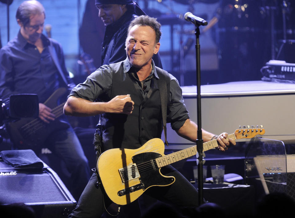 Bruce Springsteen and the E Street Band perform at the Apollo Theater on Friday, March 9, 2012 in New York. The concert was hosted by SiriusXM in celebration of 10 years of satellite radio. (AP Photo/Evan Agostini)