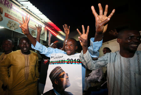 Supporters of Nigeria's President Muhammadu Buhari celebrate in Kano, Nigeria after he won a second term February 26, 2019. REUTERS/Afolabi Sotunde