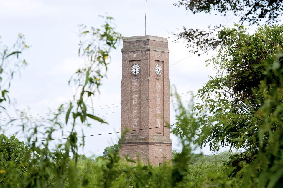 The iconic clock tower will serve as the center of the Enka Center development.