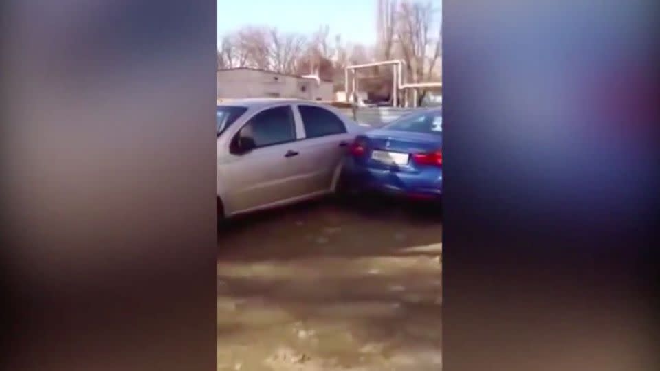 The woman hits yet another car in her series of fender benders in the parking lot. Photo: YouTube