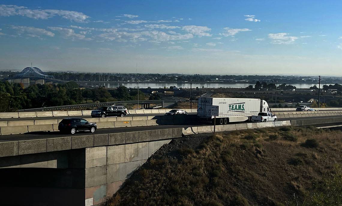 A 27-year-old man was killed when a truck hit his stopped car in the southbound lanes of Highway 395.