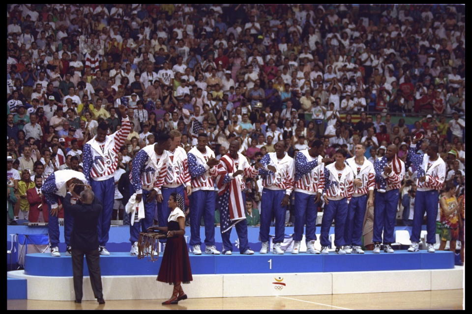 8 Aug 1992: Christian Laettner of the USA Dream Team bends over to receive his gold medal during the medal ceremony following the basketball finals in the 1992 Summer Olympics in Barcelona, Spain. Mandatory Credit: Mike Powell/Allsport