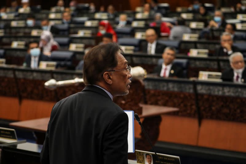 Malaysia's opposition leader Anwar Ibrahim speaks during a session of the lower house of parliament, in Kuala Lumpur