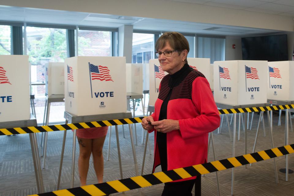 Gov. Laura Kelly walks through the Shawnee County Elections Office on July 29 to cast her ballot for the primary elections.