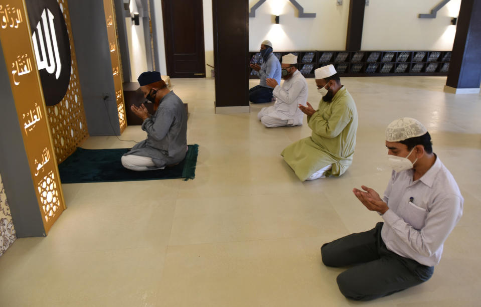 LUCKNOW, INDIA - JUNE 8: People maintain social distancing while praying at the Eidgah Mosque in Aishbagh as religious places open to the public, on June 8, 2020 in Lucknow, India. (Photo by Dheeraj Dhawan/Hindustan Times via Getty Images)