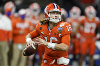 FILE - Clemson quarterback Trevor Lawrence passes against Ohio State during the first half of the Sugar Bowl NCAA college football game in New Orleans, in this Friday, Jan. 1, 2021, file photo. The Jacksonville Jaguars have done just about everything short of announce Lawrence as their first pick in the NFL Draft. (AP Photo/John Bazemore, File)