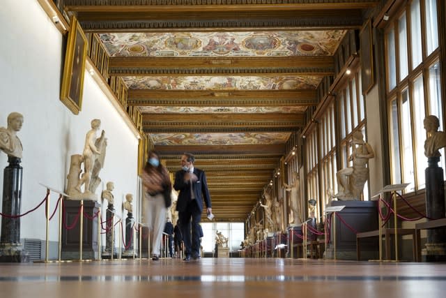 People walk in the Uffizi gallery (Andrew Medichini/AP)