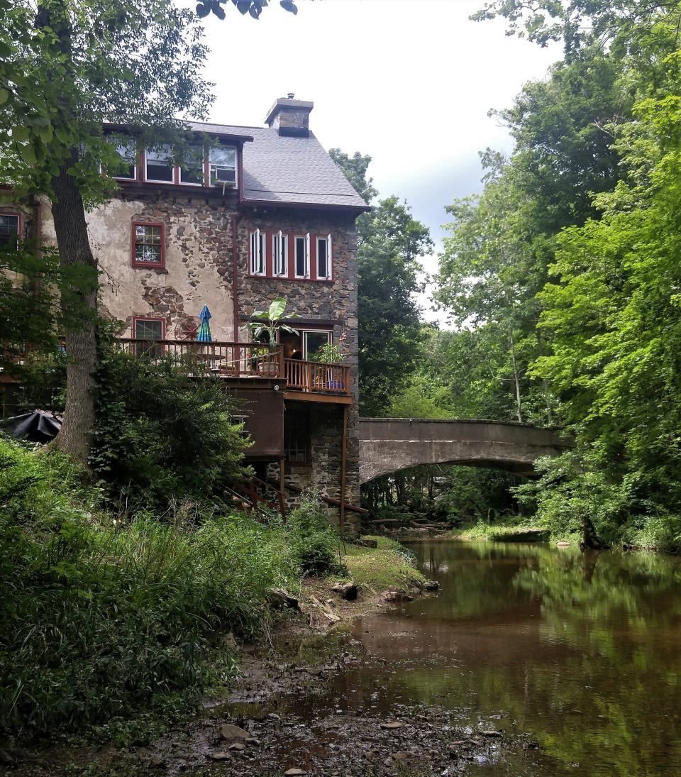 Achey's Mill built in 1750 in Milford Square in Upper Bucks looms over Unami Creek.